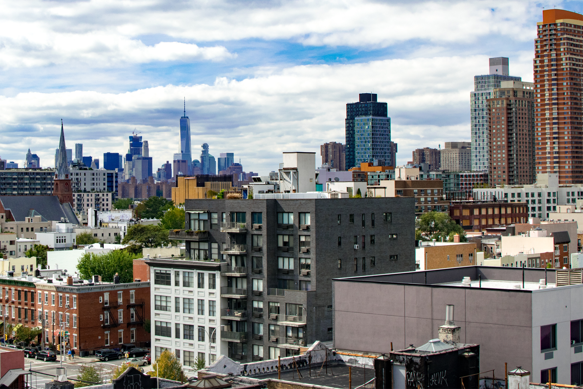 Queens with NYC skyline in the back